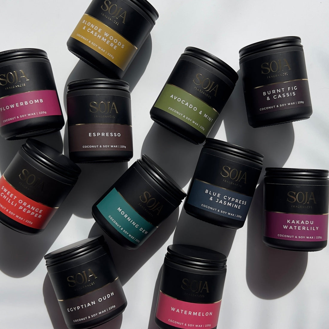 Flat lay of crystal-infused candles arranged in different home settings.