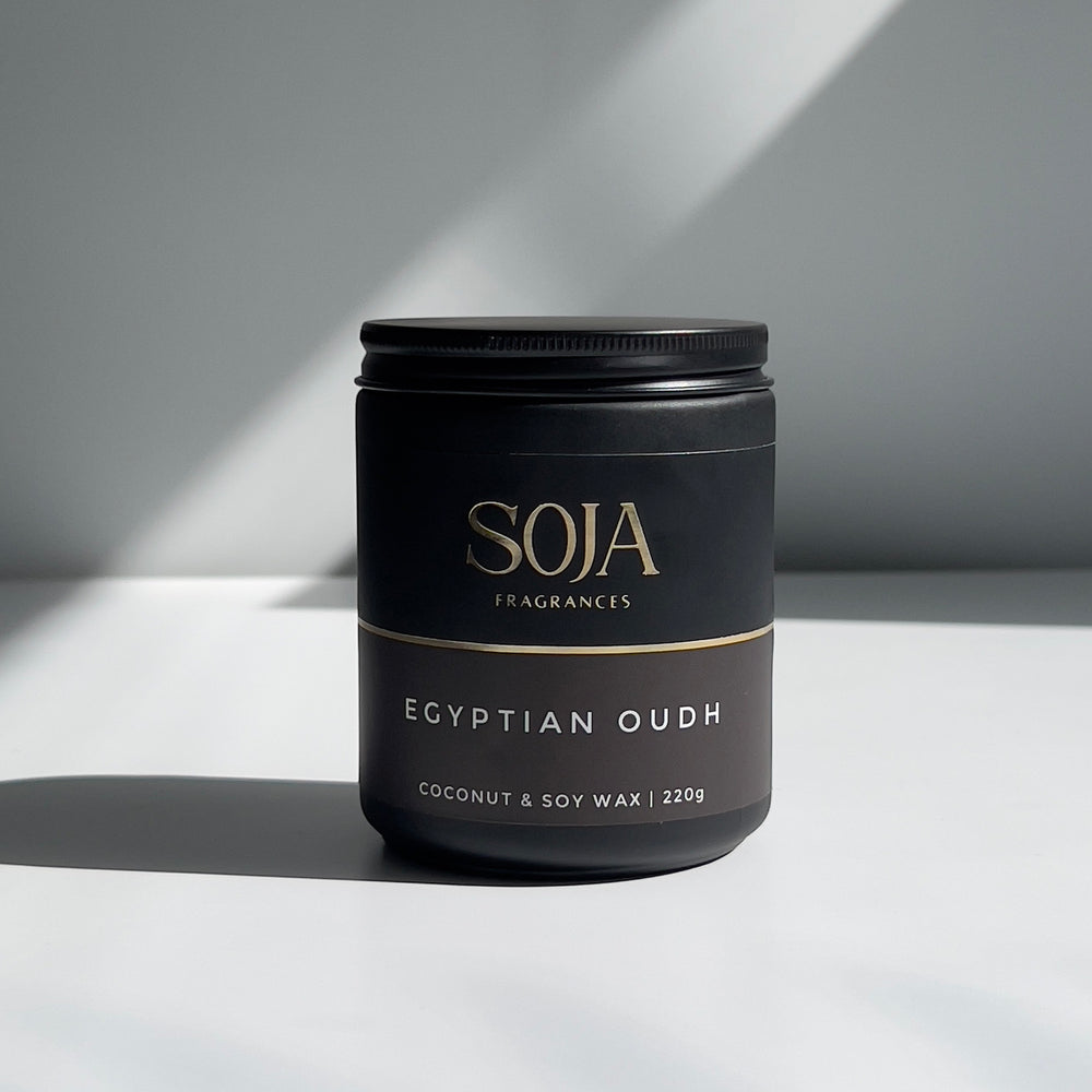 Egyptian Oudh scented soy candle in amber tones