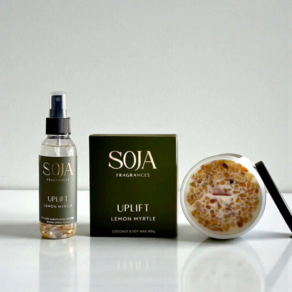 SOJA Fragrances products including a bottle, box, and jar on a white surface with a light gray background.