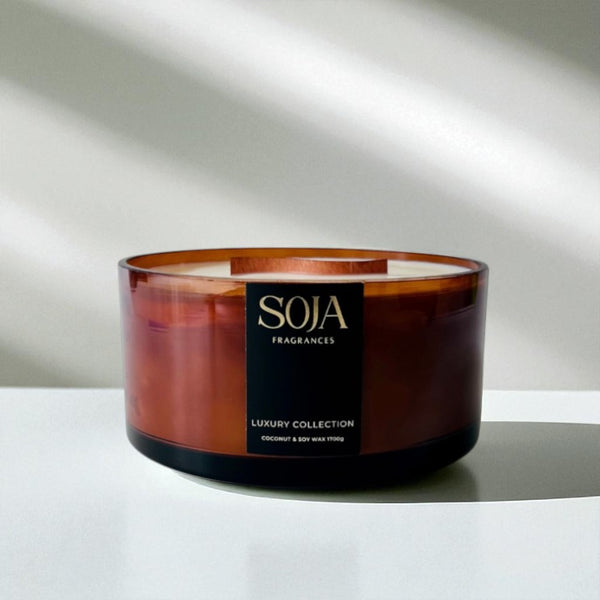 Amfer soja branded candle on white background