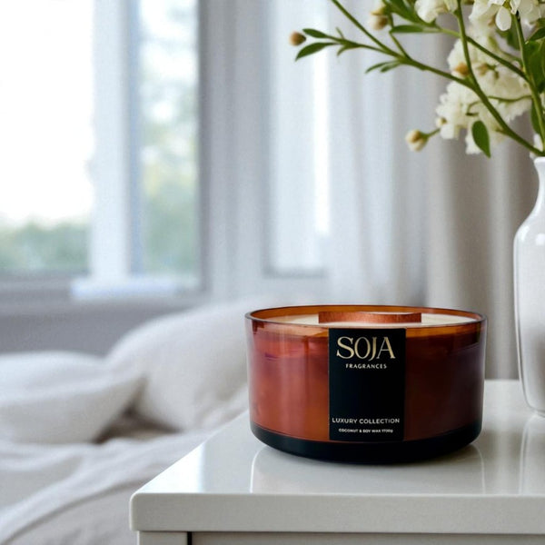Soja amber candle on bedside table