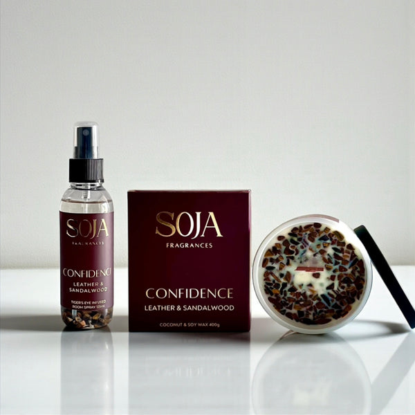 SOJA Fragrances 'Confidence' product set on a reflective surface with a neutral background