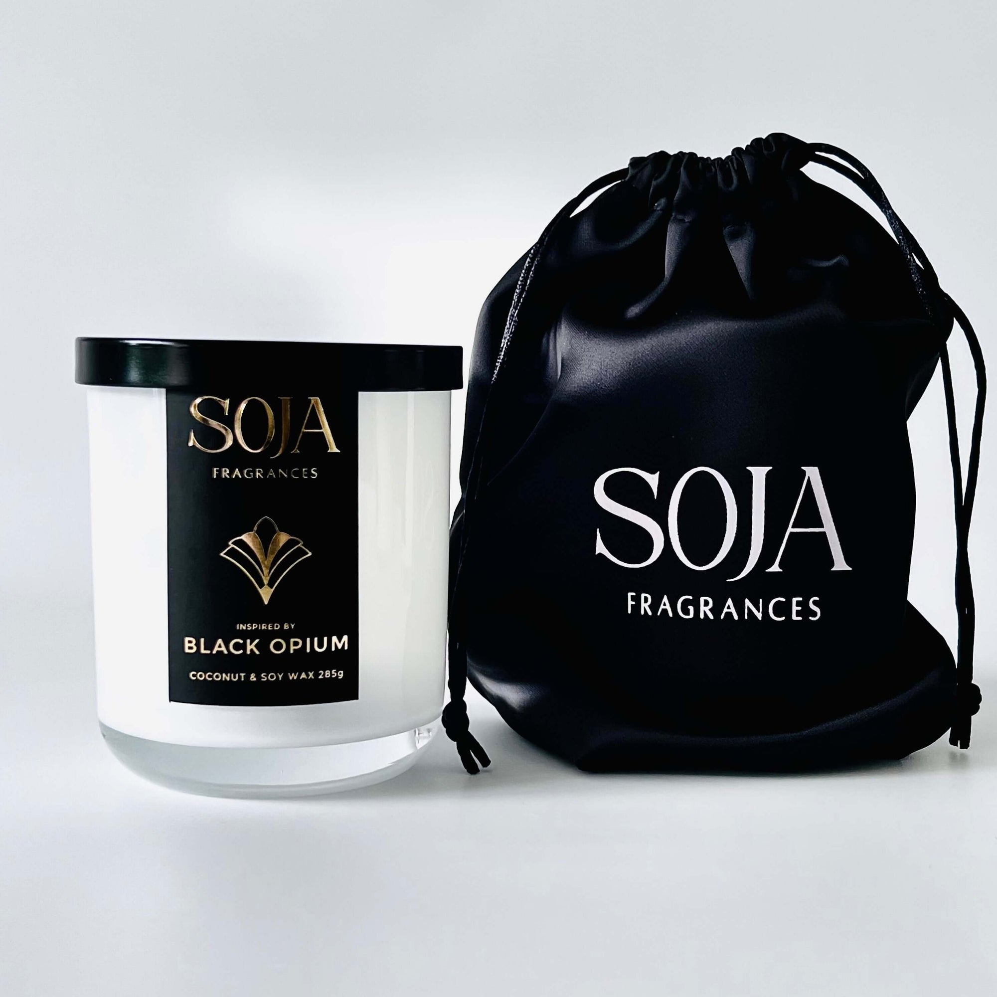 Black opium perfumed candle with black satin product bag