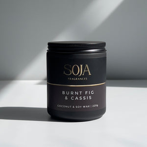 Burnt Fig & Cassis candle in glass jar with earthy aroma