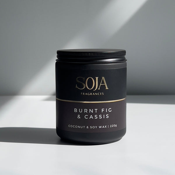 Burnt Fig & Cassis candle in glass jar with earthy aroma