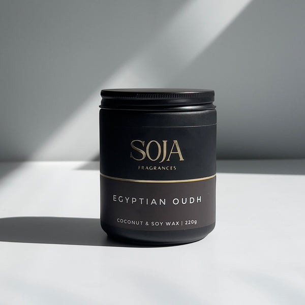 Egyptian Oudh scented soy candle in amber tones
