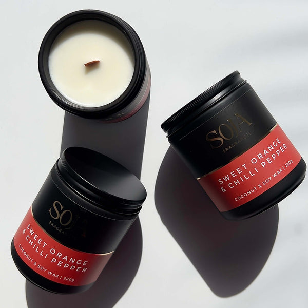Bright and spicy home fragrance in minimalist candle jar