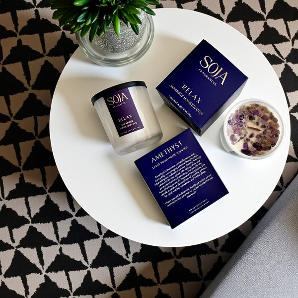 Relax crystal candle and packaging styled on decorative tray