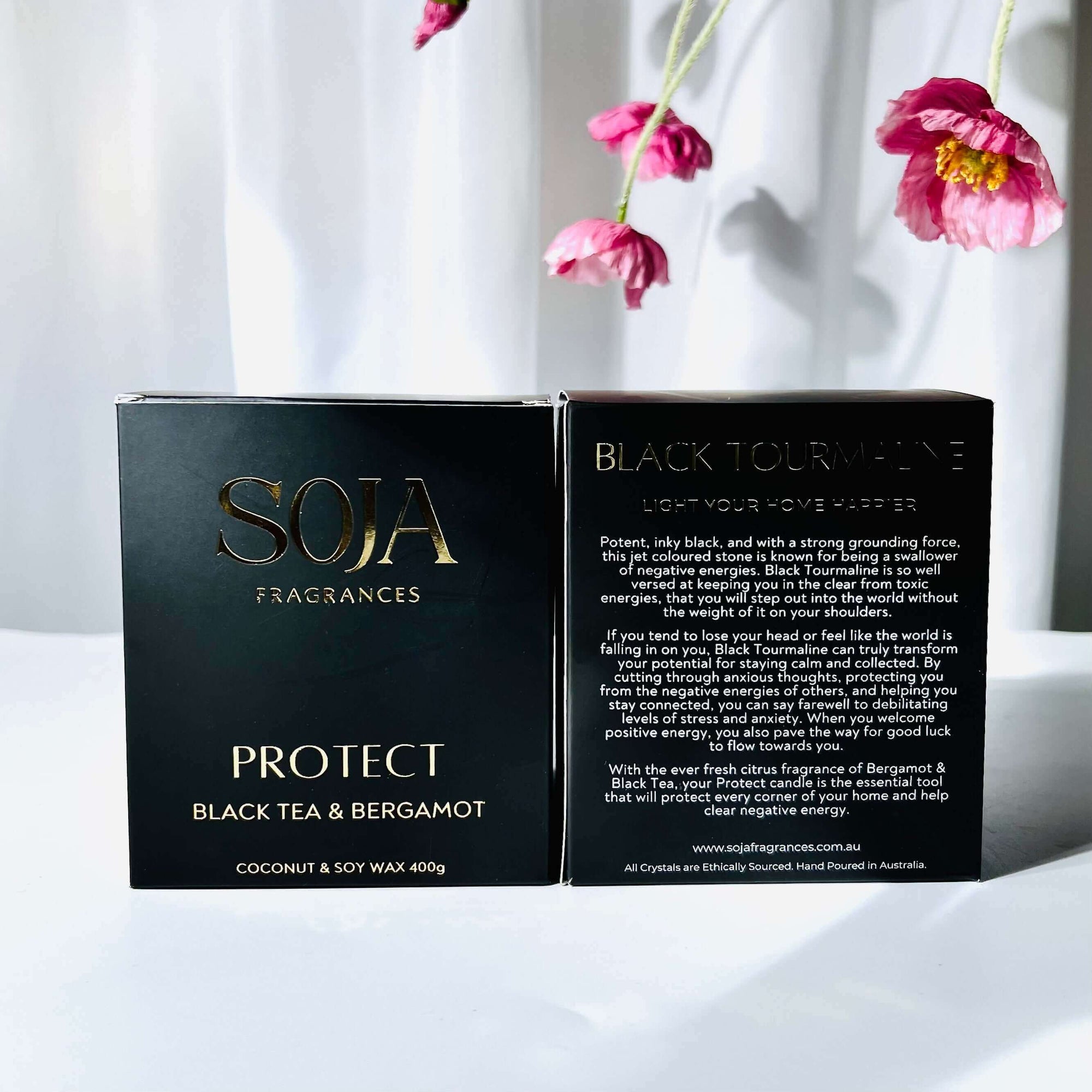 protect black tourmaline crystals black tea and bergamot fragranced candle showing back and front of packaging
